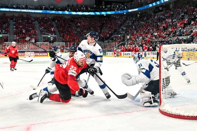 ZURICH, SWITZERLAND - MAY 31: Nino Niederreiter of Switzerland gets hit by Henri Jokiharju of Finland L) and Urho Vaakanainen of Finland R) during the 2026 IIHF Ice hockey, Eishockey World Championship, WM, Weltmeisterschaft Switzerland Gold Medal game between Switzerland and Finland at Swiss Life Arena on May 31, 2026 in Zurich, Zurich. Zurich Swiss Life Arena Zurich Switzerland Copyright: xJustPictures.ch AndreaxBrancax jp-en-EuSpIm-JP7_ANB_SuiFin_31052026_9545