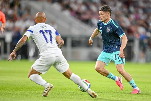 Nikolai Alho (Finland) and Florian Wirtz (Germany) battle for the ball during the International Friendly, Länderspiel, Nationalmannschaft match between Germany and Finland at MEWA Arena on May 31, 2026 in Mainz, Germany. (Photo by Harry Langer DeFodi Images) -