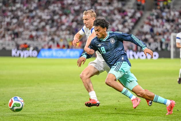 Topi Kesskinen (Finland) and Nathaniel Brown (Germany) battle for the ball during the International Friendly, Länderspiel, Nationalmannschaft match between Germany and Finland at MEWA Arena on May 31, 2026 in Mainz, Germany. (Photo by Harry Langer DeFodi Images) -