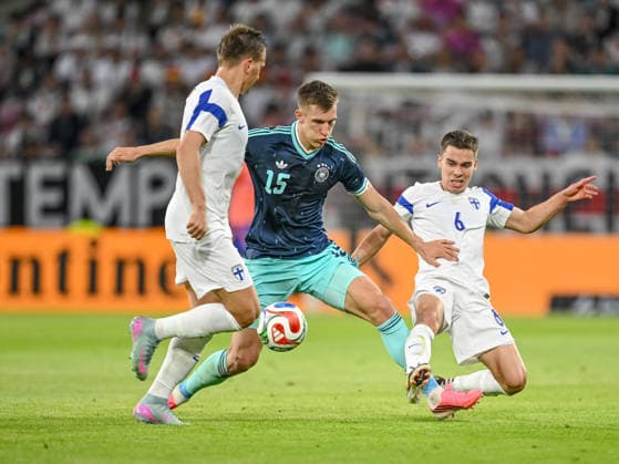 Robin Lod (Finland, Nico Schlotterbeck (Germany) and Leo Walta (Finland) battle for the ball during the International Friendly, Länderspiel, Nationalmannschaft match between Germany and Finland at MEWA Arena on May 31, 2026 in Mainz, Germany. (Photo by Harry Langer DeFodi Images) -