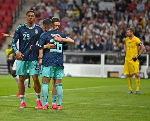 31.05.2026, Fussball Freundschafts-Länderspiele 3.Spieltag, Deutschland - Finnland, in der Mewa-Arena Mainz, v.l. Felix Nmecha (Deutschland), Florian Wirtz (Deutschland) und Deniz Undav (Deutschland) jubeln. Torwart Lukas Hradecky (Finnland) ist enttäuscht.