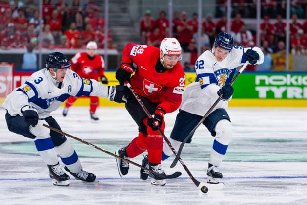 ZURICH, SWITZERLAND - MAY 31: Timo Meier (Switzerland, 28) in the battle for the puck with Olli Maeaettae (Finland, 3) and Lenni Haemeenaho (Finland, 92) during the Gold Medal Game - Match 64 between Switzerland and Finland at the IIHF Ice hockey, Eishockey World Championship, WM, Weltmeisterschaft 2026, Swiss Life Arena on May 31, 2026 in Zurich, Switzerland. Zurich Switzerland Copyright: xTimoxSteinx
