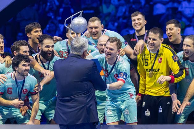 Timo Kastening (MT Melsungen) gets the EHF-Cup at the award ceremony during the handball final of the Winamax EHF Finals 2026 between THW Kiel and MT Melsungen at Barclays Arena on May 31, 2026 in Hamburg, Germany. -