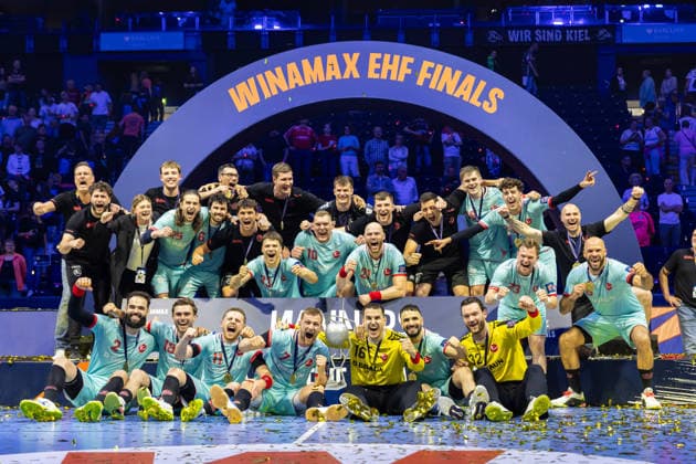 . The Players of MT Melsungen celebrate at the award ceronomy during the handball final of the Winamax EHF Finals 2026 between THW Kiel and MT Melsungen at Barclays Arena on May 31, 2026 in Hamburg, Germany. -