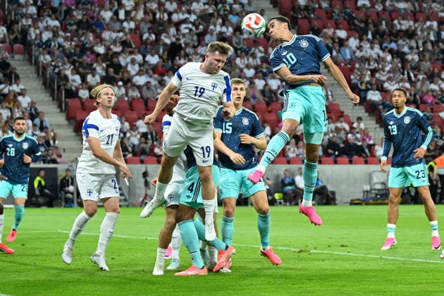 (260601) -- MAINZ, June 1, 2026 -- Jamal Musiala (R, top) of Germany and Benjamin Kallman (L, top) of Finland head for the ball during an International Friendly, Länderspiel, Nationalmannschaft football match between Germany and Finland in Mainz, Germany, May 31, 2026. (Photo by Xinhua) (SP)GERMANY-MAINZ-FOOTBALL-FRIENDLY-GERMANY VS FINLAND UlrichxHufnagel 