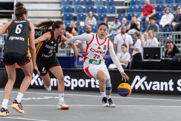 FIBA 3x3 World Cup 2026 - Warsaw, Poland - Day 1 Marie Reichert from Germany and Lili Wang from China are seen in action during the FIBA 3x3 World Cup 2026 group stage match in Warsaw, Poland. Warsaw Poland  Copyright: xMarekxAntonixIwaÅ czukx originalFilename:iwanczuk-day1ofth260601_npWrI.jpg