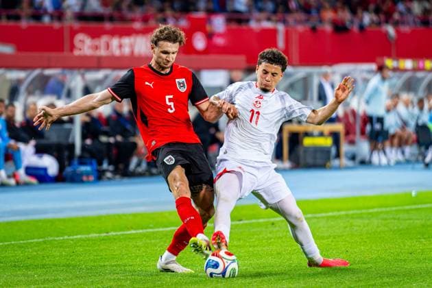 SOCCER - AUT vs TUN, test match VIENNA,AUSTRIA,01.JUN.26 - SOCCER - OEFB international test match, Austria vs Tunisia. Image shows Stefan Posch (AUT) and Ismael Gharbi (TUN).  GEPAxpictures xKevinxHackner
