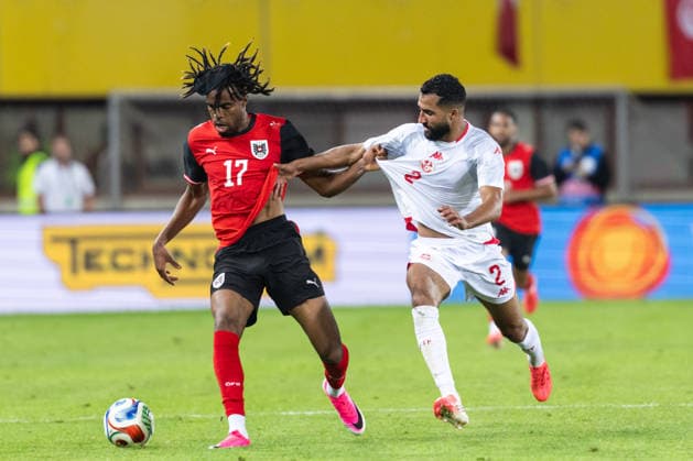 SOCCER - AUT vs TUN, test match VIENNA,AUSTRIA,01.JUN.26 - SOCCER - OEFB international test match, Austria vs Tunisia. Image shows Carney Chukwuemeka (AUT) and Ali Abdi (TUN).  GEPAxpictures xArminxRauthner