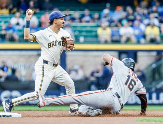 Milwaukee Brewers shortstop David Hamilton (L) forces out San Francisco Giants designated hitter Rafael Devers and turns a double play on San Francisco Giants second baseman Luis Arraez in the first inning of the MLB, Baseball Herren, USA game between the San Francisco Giants and the Milwaukee Brewers at American Family Field in Milwaukee, Wisconsin on Monday, June 1, 2026.  MIL20260601803 TANNENxMAURY