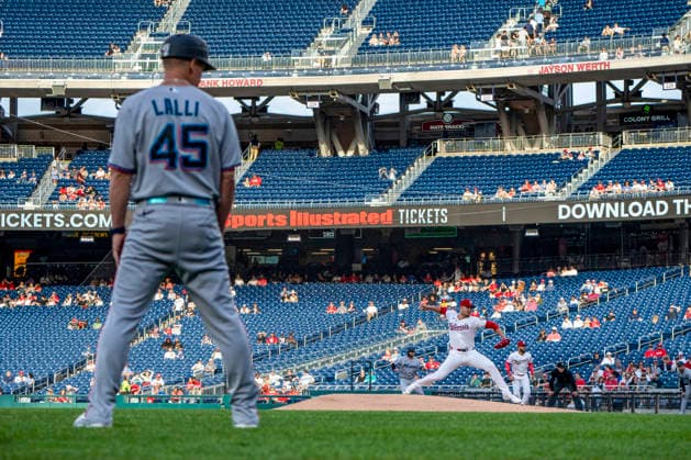 Miami Marlins third base coach Blake Lalli (45) looks on as Washington Nationals pitcher Cade Cavalli (24) pitches in the top of the first inning during a game against the Miami Marlins at Nationals Park in Washington, DC on Monday, June 1, 2026.  WAP20260601400 BONNIExCASH