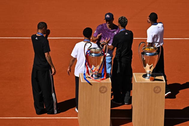 2026 French Open - PSG Players Desire DOUE of PSG, Warren ZAIRE-EMERY of PSG, Ousmane DEMBELE of PSG and Bradley BARCOLA of PSG hold the two UEFA Champions League s trophies at the 2026 Roland Garros French Tennis open tournament in Paris, France, on June 1, 2026. Photo by Corinne Dubreuil ABACAPRESS.COM Paris France  Copyright: xDubreuilxCorinne ABACAx