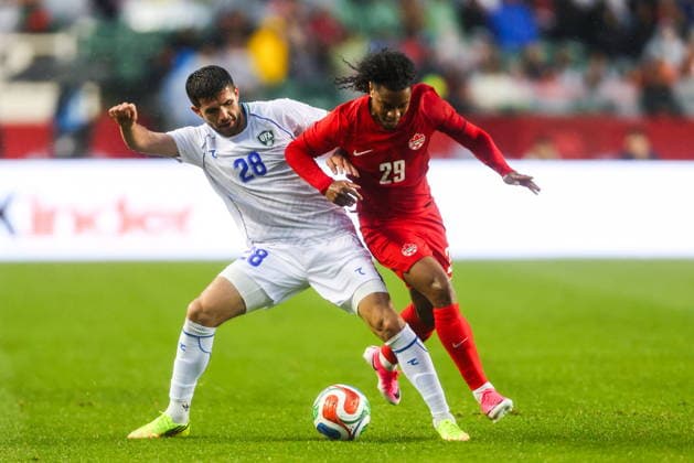 June 1, 2026, Edmonton, Ab, CANADA: Canada s Jayden Nelson (29) battles against Uzbekistan s Aziz Amonov (28) during second half World Cup Friendly soccer action in Edmonton on Monday, June 1, 2026. SOC-CANADA-OFFENCE 20260601  - ZUMAc35_ 20260601_zaf_c35_101 Copyright: xCodiexMclachlanx