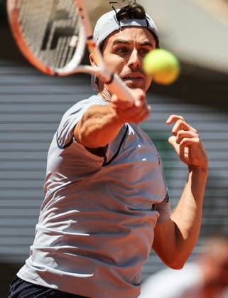 (260602) -- PARIS, June 2, 2026 -- Zachary Svajda hits a return during the men s singles 4th round match between Flavio Cobolli of Italy and Zachary Svajda of the United States at the French Open tennis tournament at Roland Garros, Paris, France, June 1, 2026. ) (SP)FRANCE-PARIS-TENNIS-FRENCH OPEN-MEN S SINGLES-4TH ROUND WuxHuiwo 