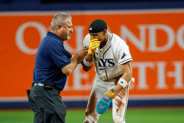 June 1, 2026, St. Petersburg, Florida, USA: Tampa Bay Rays left fielder Chandler Simpson (14) gets checked out by trainer Mike Sandoval, after he gets injured stealing second base against the Detroit Tigers during the fourth inning at Tropicana Field on Monday, June 1, 2026, in St. Petersburg. Florida News - June 1, 2026  - ZUMAs70_ 20260601_zan_s70_057 Copyright: xJeffereexWoox