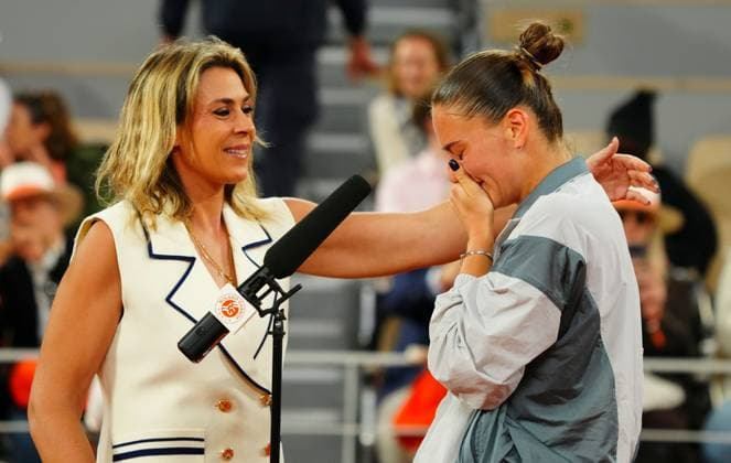 A tearful Marta Kostyuk is consoled by Marion Bartoli in her post match on court interviews French Open Tennis, Day Ten, Tennis, Roland Garros, Paris, France - 02 Jun 2026Paris Roland Garros France EDITORIAL USE ONLY No use with unauthorised audio, video, data, fixture lists, club league logos or live services. Online in-match use limited to 120 images, no video emulation. No use in betting, games or single club league player publications.  Copyright: xJavierxGarcia Shutterstockx 16906549f