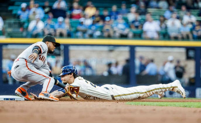 Milwaukee Brewers designated hitter Christian Yelich (R) steals second base on San Francisco Giants second baseman Luis Arraez (L) in the first inning of the MLB, Baseball Herren, USA game between the San Francisco Giants and the Milwaukee Brewers at American Family Field in Milwaukee, Wisconsin on Tuesday, June 2, 2026.  MIL20260602805 TANNENxMAURY