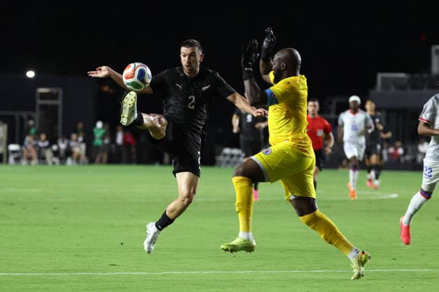 FT. LAUDERDALE, FL - JUNE 02: New Zealand defender Tim Payne (2) attacks with the ball as Haiti goalkeeper Johnny Placide (1) defends in the first half during the soccer match between Haiti and New Zealand on Tuesday, June 2, 2026 at Chase Stadium in Fort Laudrdale, FL. (Photo by Peter Joneleit Icon Sportswire) SOCCER: JUN 02 Haiti vs New Zealand EDITORIAL USE ONLY Icon260602007