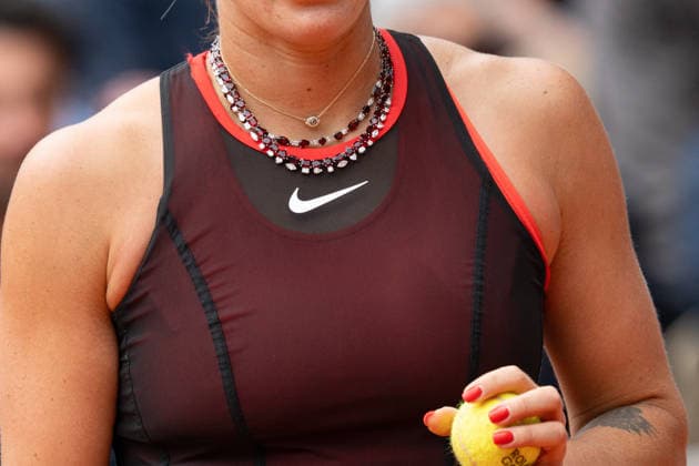 French Open - Aryna Sabalenka A detailed view the custom Material Good Roland Garros themed necklace featuring 200 carats of garnets and 23 carats of diamonds, seen worn by Aryna Sabalenka against Diana Shnaider during their Women s Singles quarter-final match on Day Eleven of the 2026 French Open at Roland Garros on June 03, 2026 in Paris, France. Photo by Laurent Zabulon ABACAPRESS.COM Paris France  Copyright: xZabulonxLaurent ABACAx