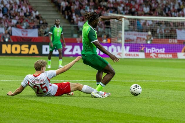 Fußball, Testspiel, Polen - Nigeria #3 Poland - Nigeria 03.06.2026 football, Warsaw, PGE National Stadium, FIFA , friendly international game match Poland - Nigeria ( mecz towarzyski, pilka nozna, Polska - Nigeria ) image shows: Kacper Potulski (L) Terem Moffi (R) photo Katarzyna Plewczynska Fotostyk Copyright: xKatarzynaxPlewczynskax 20260603FCTKPKAPL7210