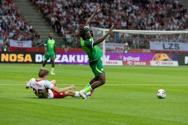 Fußball, Testspiel, Polen - Nigeria #3 Poland - Nigeria 03.06.2026 football, Warsaw, PGE National Stadium, FIFA , friendly international game match Poland - Nigeria ( mecz towarzyski, pilka nozna, Polska - Nigeria ) image shows: Kacper Potulski (L) Terem Moffi (R) photo Katarzyna Plewczynska Fotostyk Copyright: xKatarzynaxPlewczynskax 20260603FCTKPKAPL7214