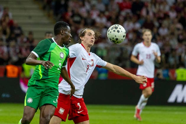 Fußball, Testspiel, Polen - Nigeria #4 Poland - Nigeria 03.06.2026 football, Warsaw, PGE National Stadium, FIFA , friendly international game match Poland - Nigeria ( mecz towarzyski, pilka nozna, Polska - Nigeria ) image shows: Zaidu Sanusi (L) Jakub Kaminski (R) photo Katarzyna Plewczynska Fotostyk Copyright: xKatarzynaxPlewczynskax 20260603FCTKPKAPL7680