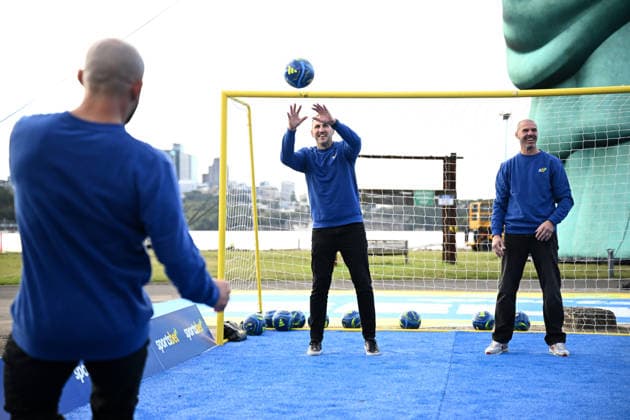 SPORTSBET WORLD CUP CAMPAIGN LAUNCH, Former Scocceroos Mark Schwarzer and Ante Covic in goal as mixed martial arts fighter Alexander Volkanovski kicks during a Sportsbet promotional event ahead of the FIFA 2026 World Cup, at Cockatoo Island in Sydney, Thursday, June 4, 2026. (AAP Image) NO ARCHIVING NO ARCHIVING SYDNEY NEW SOUTH WALES AUSTRALIA  Copyright: xAAPxIMAGEx 20260604186489690246