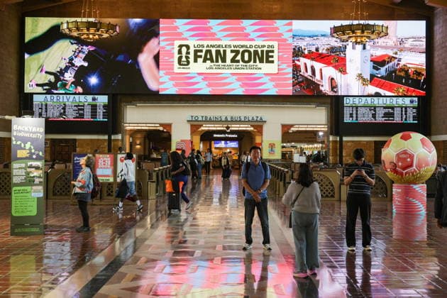 Los Angeles showcases World Cup features ahead of matches Transit riders take photos in front of the FIFA World Cup, WM, Weltmeisterschaft, Fussball signage at Union Station in Los Angeles, California, USA, 03 June 2026. Transit hubs across the city are showcasing tournament graphics ahead of the FIFA World Cup, which will bring international matches and visitors to the region. LOS ANGELES CALIFORNIA UNITED STATES  Copyright: xCHRISxTORRESx