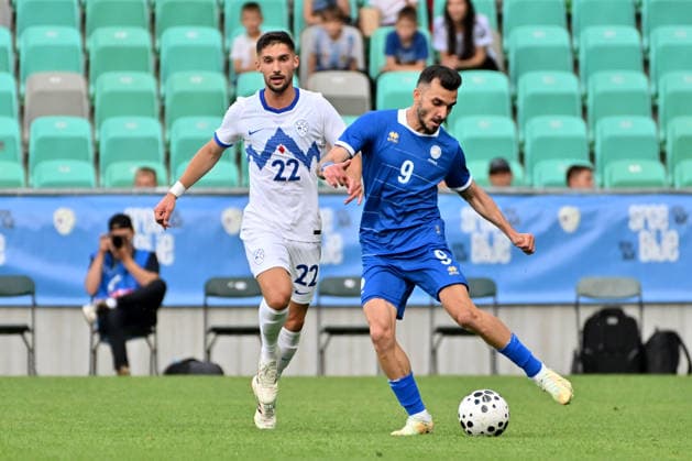 LJUBLJANA, SLOVENIA - JUNE 04: Ioannis Pittas of Cyprus (R) in action against Adam Gnezda Cerin of Slovenia (L) during the International men’s football Friendly match between Slovenia and Cyprus at Stadium Stozice, Ljubljana on June 04, 2026 in Ljubljana, Slovenia. (Photo by Igor Kupljenik Sports Press Photo).  Copyright: xIgorxKupljenikx xSPPx Sportspressphoto_SPR160715