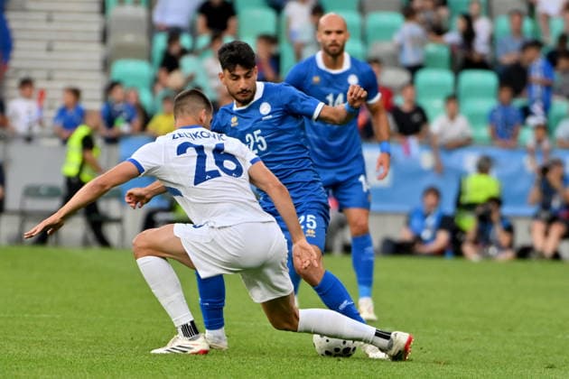 LJUBLJANA, SLOVENIA - JUNE 04: Giorgos Naoum of Cyprus (C) in action against Adrian Zeljkovic of Slovenia (L) during the International men’s football Friendly match between Slovenia and Cyprus at Stadium Stozice, Ljubljana on June 04, 2026 in Ljubljana, Slovenia. (Photo by Igor Kupljenik Sports Press Photo).  Copyright: xIgorxKupljenikx xSPPx Sportspressphoto_SPR160762