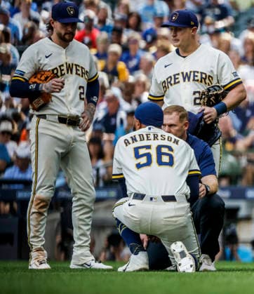 Milwaukee Brewers relief pitcher Grant Anderson is checked after getting hit with a ball off the bat of San Francisco Giants designated hitter Bryce Eldridge in the sixth inning of the MLB, Baseball Herren, USA game between the San Francisco Giants and the Milwaukee Brewers at American Family Field in Milwaukee, Wisconsin on Thursday, June 4, 2026.  MIL20260604834 TANNENxMAURY