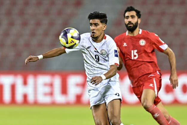 Lebanon v Yemen - AFC Asian Cup 2027 Qualifiers Ihad Ayoub (R) of Lebanon and Omar Al-Dahi of Yemen compete during the Asian Cup Saudi Arabia 2027 Qualifiers match between Lebanon and Yemen at Grand Hamad Stadium Stadium in Doha, Qatar, on June 4, 2026. DOHA Qatar Copyright: xNOUSHADx
