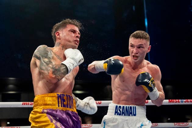 June 4, 2026, Montreal, Pq, CANADA: Dzmitry Asanau, right hits Roger Gutierrez during their IBF and WBC Continental lightweight championship fight, in Montreal on Thursday, June 4, 2026. Canada News - June 4, 2026  - ZUMAc35_ 20260604_zaf_c35_140 Copyright: xChristopherxKatsarovx