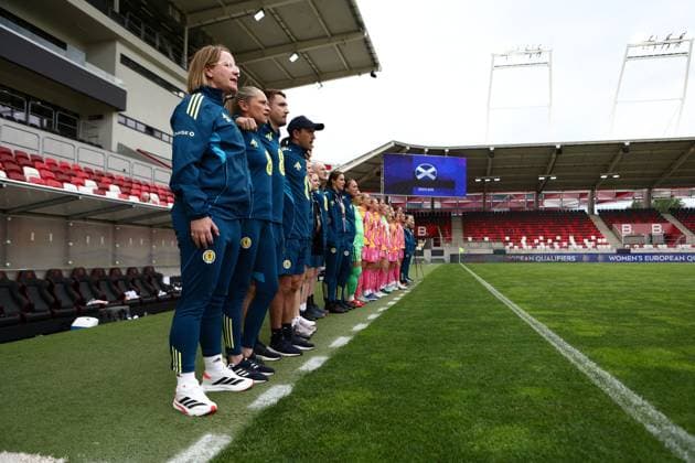Melissa Andreatta manager of Scotland Women and backroom staff during the national anthem Scotland Women v Israel Women, FIFA 2027 Women s World Cup Qualifying, Football, Bozsnik Arena, Budapest, Hungary - 05 Jun 2026Budapest Bozsnik Arena Hungary EDITORIAL USE ONLY No use with unauthorised audio, video, data, fixture lists, club league logos or live services. Online in-match use limited to 120 images, no video emulation. No use in betting, games or single club league player publications.  Copyright: xNikolaxKrstic Shutterstockx 16911189am