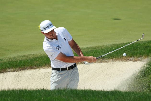 The Memorial Tournament DUBLIN, OHIO - JUNE 05: J.T. Poston plays hits out of the bunker toward the 18th green during the second round of The Memorial Tournament presented by Workday at Muirfield Village Golf Club in Dublin, Ohio, USA on Friday, June 5, 2026. Dublin Ohio United States  Copyright: xJorgexLemusx originalFilename:lemus-thememor260605_npyys.jpg