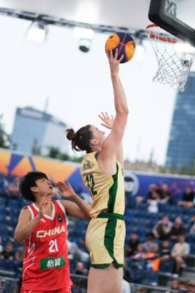 June 5, 2026, Warsaw, Masovian Voivodeship, Poland: Australia s HANNAH HANK (12) and China s WENXIA LI (21) in action during a FIBA 3x3 Basketball World Cup women s last 16 game between Australia and China in Warsaw, Poland. Warsaw Poland - ZUMAk204 20260605_zip_k204_008 Copyright: xRomanxKozielx