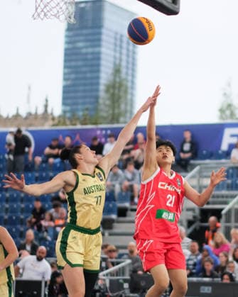 June 5, 2026, Warsaw, Masovian Voivodeship, Poland: Australia s EMMA CLARKE (77) and China s WENXIA LI (21) in action during a FIBA 3x3 Basketball World Cup women s last 16 game between Australia and China in Warsaw, Poland. Basketball 2026: FIBA 3x3 World Cup Women s Last 16: Australia 21:11 China  - ZUMAk204 20260605_zip_k204_010 Copyright: xRomanxKozielx