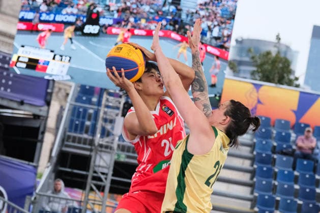 June 5, 2026, Warsaw, Masovian Voivodeship, Poland: Australia s MARENA WHITTLE (21) and China s WENXIA LI (21) in action during a FIBA 3x3 Basketball World Cup women s last 16 game between Australia and China in Warsaw, Poland. Warsaw Poland - ZUMAk204 20260605_zip_k204_029 Copyright: xRomanxKozielx