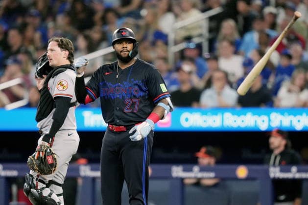 June 5, 2026, Toronto, On, CANADA: Toronto Blue Jays Vladimir Guerrero Jr. (27) flips his bat after striking out as Baltimore Orioles catcher Adley Rutschman (35) walks past during fifth inning American League, MLB, Baseball Herren, USA baseball action in Toronto on Friday, June 5, 2026. Canada News - June 5, 2026 - ZUMAc35_ 20260605_zaf_c35_103 Copyright: xNathanxDenettex