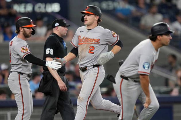 June 5, 2026, Toronto, On, CANADA: Baltimore Orioles Henderson (2) scores a run and celebrates with Taylor Ward (3), left, against the Toronto Blue Jays during ninth inning American League, MLB, Baseball Herren, USA baseball action in Toronto on Friday, June 5, 2026. Canada News - June 5, 2026 - ZUMAc35_ 20260605_zaf_c35_119 Copyright: xNathanxDenettex