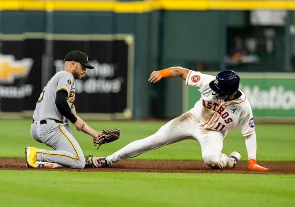 June 2, 2026, Houston, Texas, United States: Houston Astros right fielder Cam Smith (11) steals second beating the tag by Pittsburgh Pirates second baseman Brandon Lowe (5) during an MLB, Baseball Herren, USA game on Tuesday June 2, 2026 at Daikin Park in Houston, Texas. The Pirates defeated the Astros 10-6. Houston United States - ZUMAw132 20260602_zap_w132_024 Copyright: xTomxWalkox