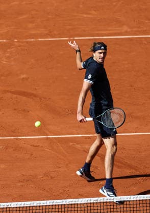(260606) -- PARIS, June 6, 2026 -- Alexander Zverev hits a return during the men s singles semifinal match between Alexander Zverev of Germany and Jakub Mensik of the Czech Republic at the French Open tennis tournament at Roland Garros, Paris, France, June 5, 2026. ) (SP)FRANCE-PARIS-TENNIS-FRENCH OPEN-MEN S SINGLES-SEMIFINAL WuxHuiwo 