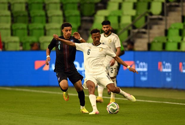 AUSTIN, TX - June 05: Saudi Arabia defender Nasser Aldawsari (6) launches a pass as Puerto Rico player Adyn Torres (4) defends during International Friendly, Länderspiel, Nationalmannschaft between Saudi Arabia and Puerto Rico on June 5, 2026 at Q2 Stadium in Austin, TX. (Photo by John Rivera Icon Sportswire) SOCCER: JUNE 05 International Friendly Saudi Arabia vs. Puerto Rico EDITORIAL USE ONLY Icon426260605026