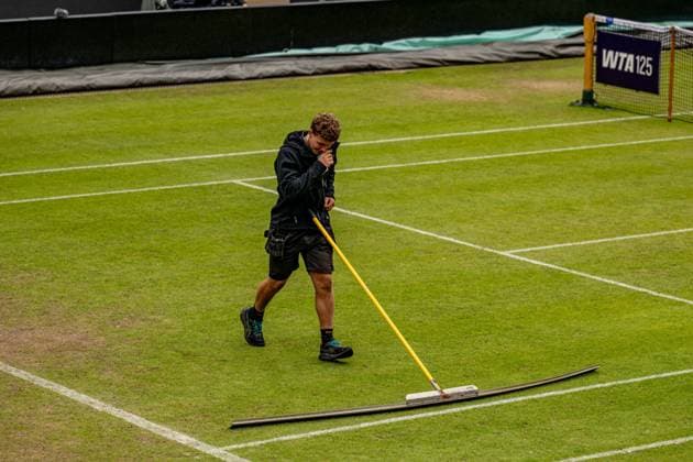 RECORD DATE NOT STATED 6th June 2026; The Edgbaston Priory Club, Birmingham, Midlands, England; 2026 Lexus Birmingham Open Tennis, Day Eight; Groundstaff at Edgbaston Priory Club, Birmingham use large brushes to try to keep the court playable during a period of light rain GodfreyxPitt