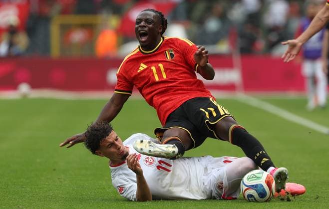 Tunisian Ismael Gharbi and Belgium s Jeremy Doku fight for the ball during a friendly soccer game between Belgian national team, Nationalteam Red Devils and Tunisia, Saturday 06 June 2026 in Brussels, part of the preparations for the 2026 FIFA World Cup, WM, Weltmeisterschaft, Fussball VIRGINIExLEFOUR  x176307493x