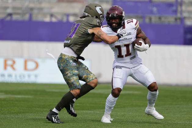 AMERICAN FOOTBALL - AFLE, Vikings vs Fire VIENNA,AUSTRIA,06.JUN.26 - AMERICAN FOOTBALL - AFLE, American Football League Europe, Vienna Vikings vs Rhein Fire. Image shows Pablo Araya (Vikings) and Jonathan Scott (Rhein Fire).  GEPAxpictures xDavidxBitzan