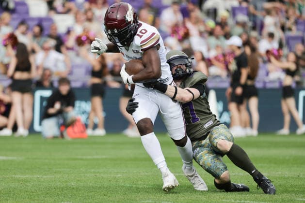 AMERICAN FOOTBALL - AFLE, Vikings vs Fire VIENNA,AUSTRIA,06.JUN.26 - AMERICAN FOOTBALL - AFLE, American Football League Europe, Vienna Vikings vs Rhein Fire. Image shows Harlan Kwofie (Rhein Fire) and Sean Rae Trotter (Vikings).  GEPAxpictures xDavidxBitzan