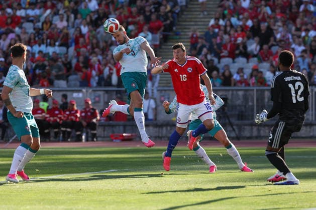 Ruben Dias (Portugal), Gonzalo Tapia (Chile) in action, with the ball during the International Friendly, Länderspiel, Nationalmannschaft match between Portugal and Chile at Estadio Nacional do Jamor on June 6, 2026, in Oeiras, Portugal. The match serves as preparation for the 2026 FIFA World Cup, WM, Weltmeisterschaft, Fussball in the United States. Copyright: JoaquimxFerreira