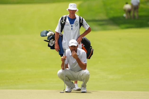 DUBLIN, OH - JUNE 06: Scottie Scheffler of the United States and his caddie Ted Scott look over the green on hole 2 during third round of the Memorial Tournament on June 06, 2026 at the Muirfield Village Golf Club in Dublin, Ohio. (Photo by Jason Mowry Icon Sportswire) GOLF: JUN 06 PGA, Golf Herren the Memorial Tournament presented by Workday EDITORIAL USE ONLY Icon260606026