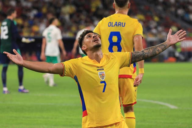 Saturday, 6 June 2026, Bucuresti, Romania, UEFA Friendly Matches, Romania vs Wales Steaua Bucharest Stadium, Bucuresti 7 Florinel Coman celebrates scoring his first goal of the match and kneels before supporters