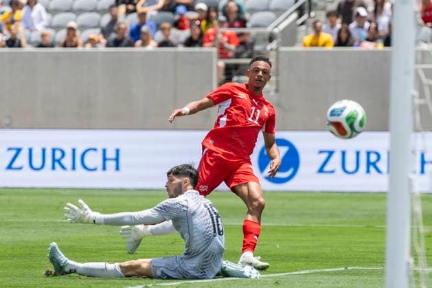 International soccer friendly - Switzerland vs Australia Switzerland s Dan Ndoye scores the 1-0 goal against Australia s goalkeeper Patrick Beach during an International Friendly, Länderspiel, Nationalmannschaft soccer match between Switzerland and Australia in San Diego, California, USA, 06 June 2026. San Diego St. Gallen United States  Copyright: xPETERxKLAUNZERx